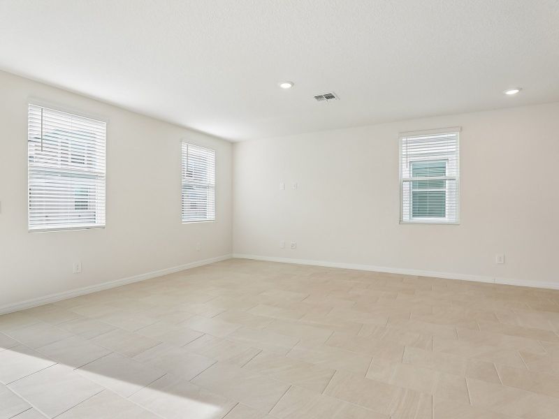 Spacious, unfurnished interior of a new home in The Meadow at Crossprairie Townes, St. Cloud (Image 11).