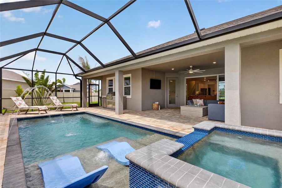 Exterior details and patio area of a home in Seaire, Parrish (Image 25).