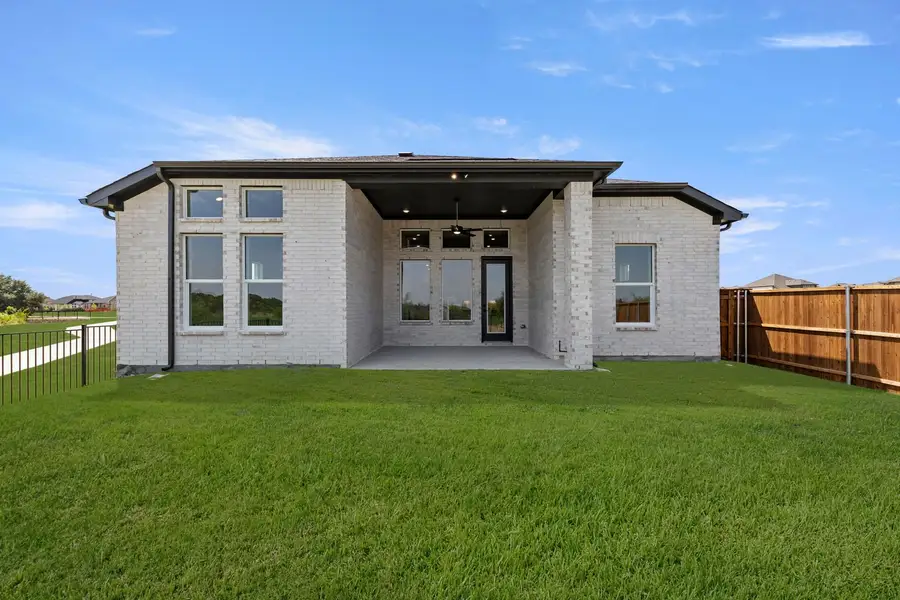 Exterior details and patio area of a home in Lily Creek at Sutton Fields, Aubrey (Image 3).