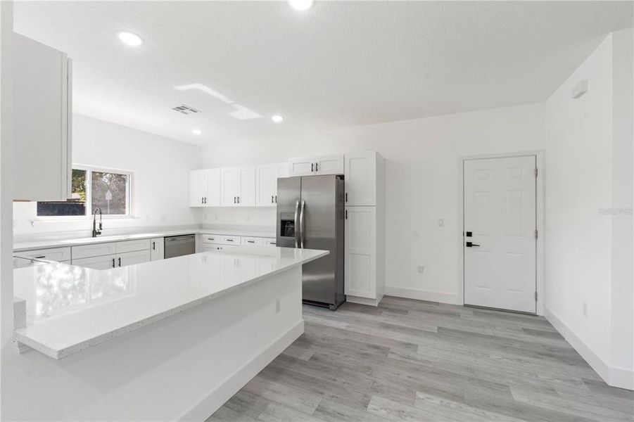 Furnished interior view inside a new home in , Clermont (Image 15).