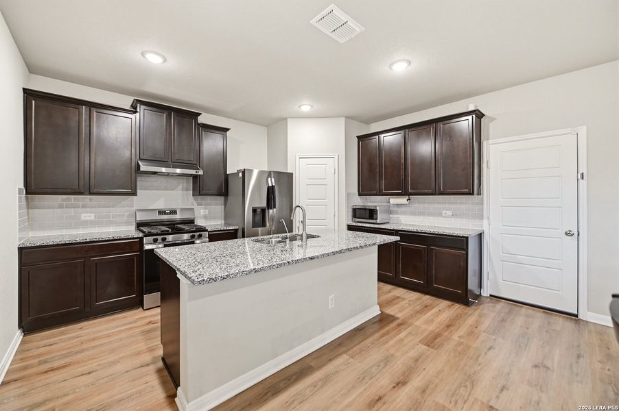 Furnished interior view inside a new home in Winding Brook, San Antonio (Image 5).