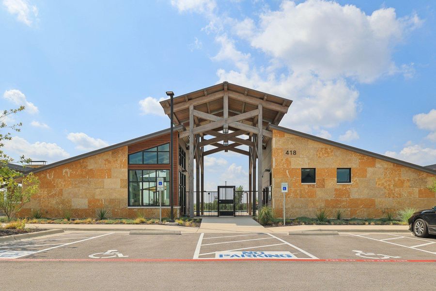 Front exterior of a new home in Emory Crossing 50s, Hutto, TX, highlighting curb appeal (Image 19). Front exterior of a new home in Emory Crossing 50s, Hutto, TX, highlighting curb appeal (Image 19).