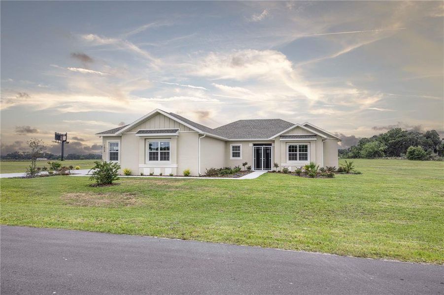 Front exterior of a new home in , Oxford, FL, highlighting curb appeal (Image 26).