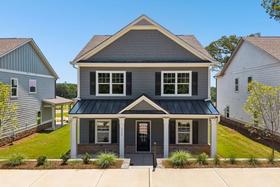 Front exterior of a new home in Magnolia Trace, Flowery Branch, GA, highlighting curb appeal (Image 3).