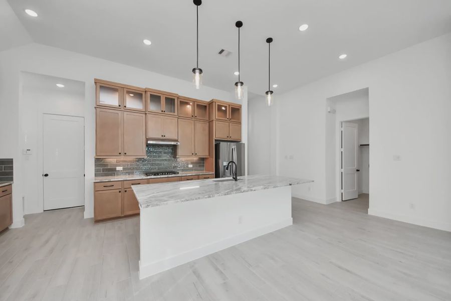 Representative furnished interior of a home built from the Summerton by Chesmar Homes in Meridiana 50's and 60's, Manvel (Image 17).