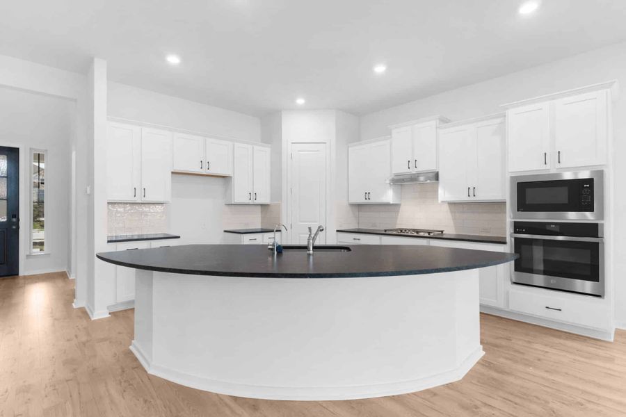 Furnished interior view inside a new home in Carillon, Manor (Image 5).