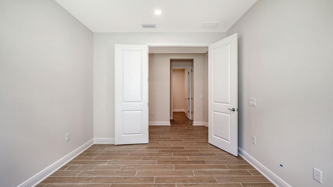 Spacious, unfurnished interior of a new home in Grand Park Real Estate and Homes for Sale in Sarasota, FL - Neal Communities, Sarasota (Image 47).