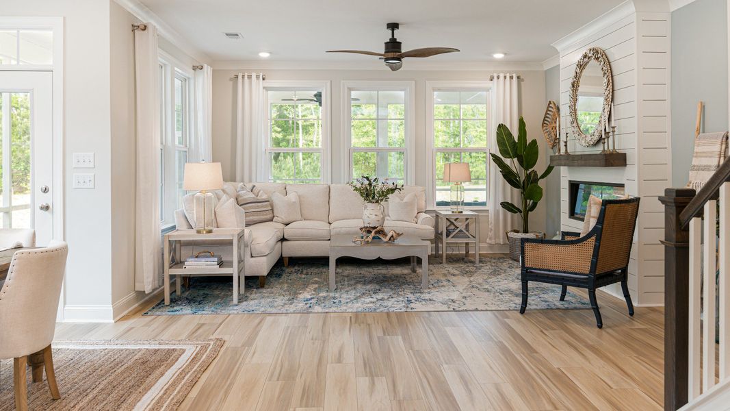 large living room with seating and cozy shiplap fireplace large living room with seating and cozy shiplap fireplace