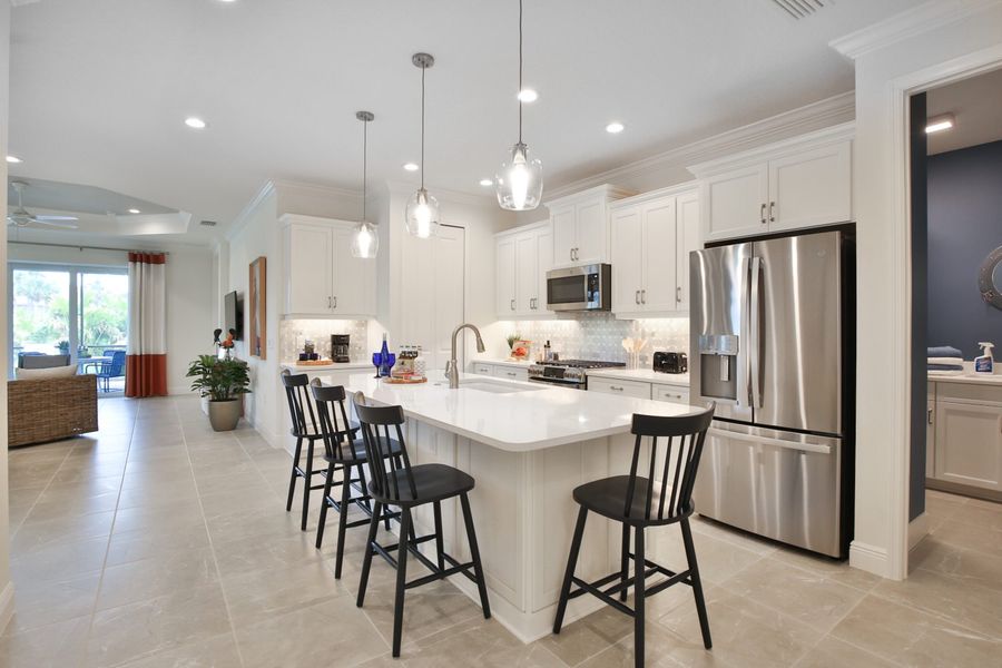 Representative furnished interior of a home built from the Sandcastle 2 by Neal Communities in Boca Royale Golf & Country Club at Wellen Park, Englewood (Image 6).