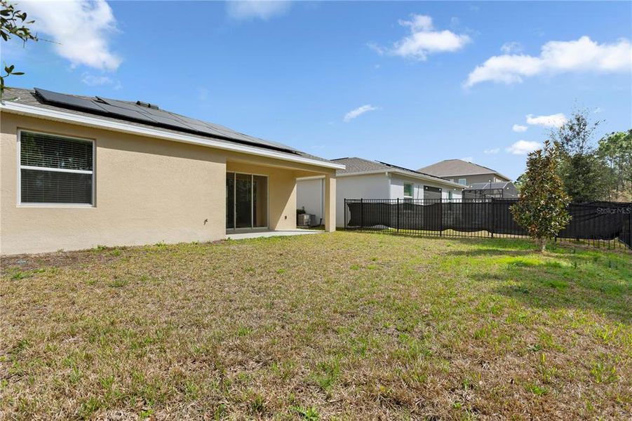 Exterior details and patio area of a home in , Davenport (Image 21).