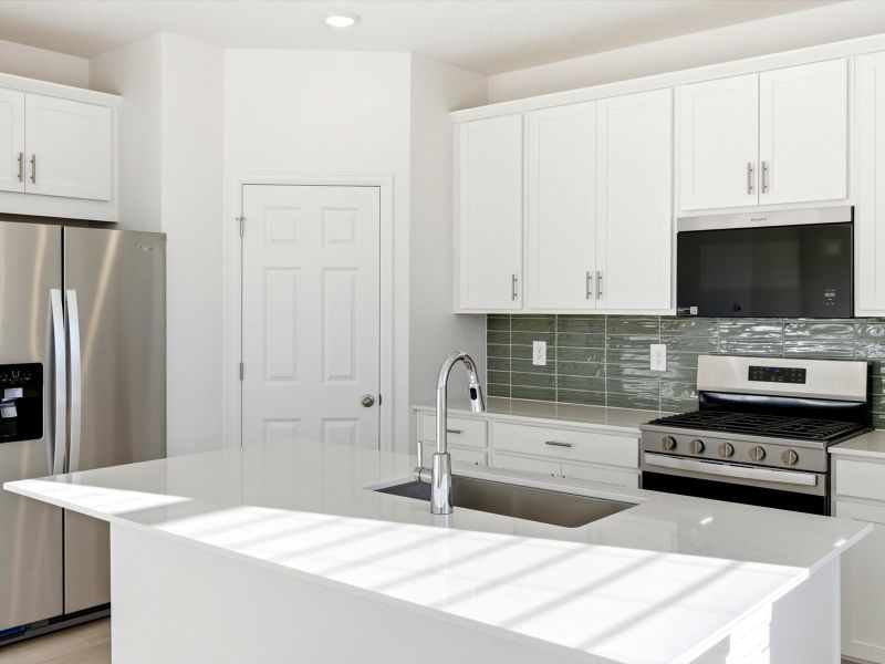 Furnished interior view inside a new home in Buffalo Highlands: The Flora Collection, Commerce City (Image 6).