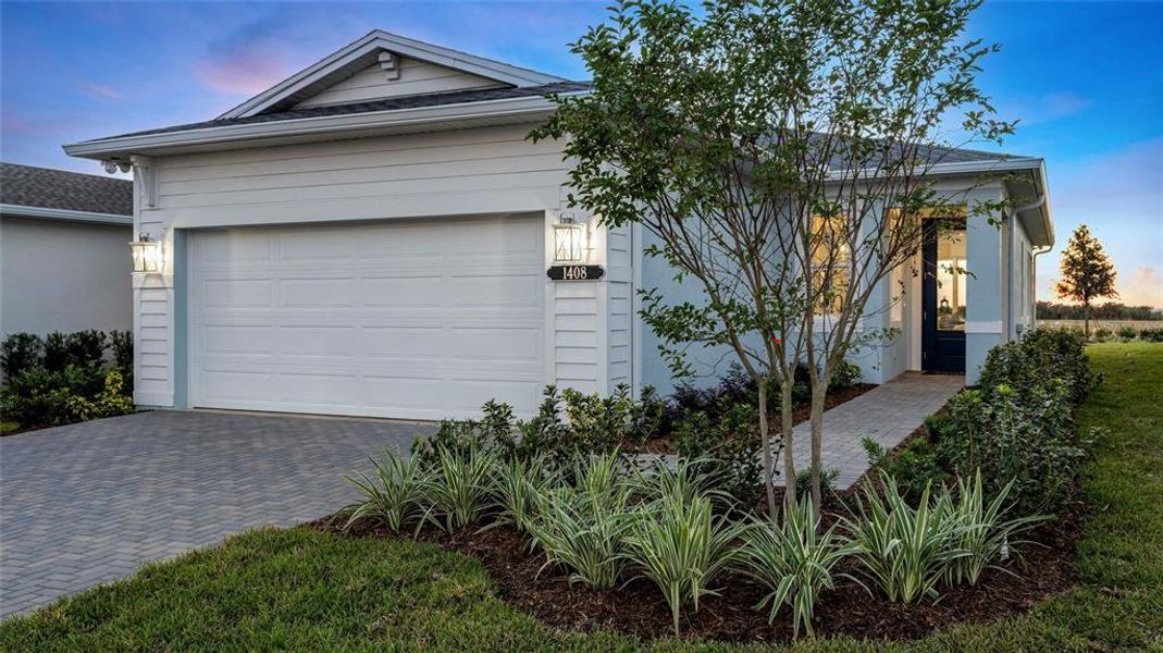 Front exterior of a new home in Cresswind at Lake Harris, Tavares, FL, highlighting curb appeal (Image 1). Front exterior of a new home in Cresswind at Lake Harris, Tavares, FL, highlighting curb appeal (Image 1).