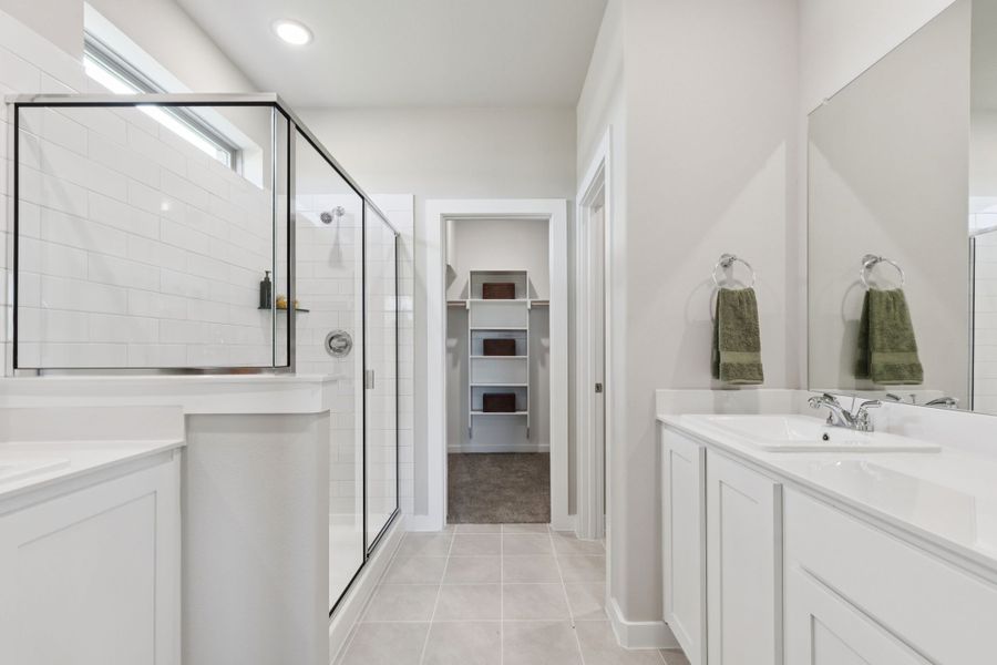 Primary Bathroom in the Magnolia home plan by Trophy Signature Homes – REPRESENTATIVE PHOTO