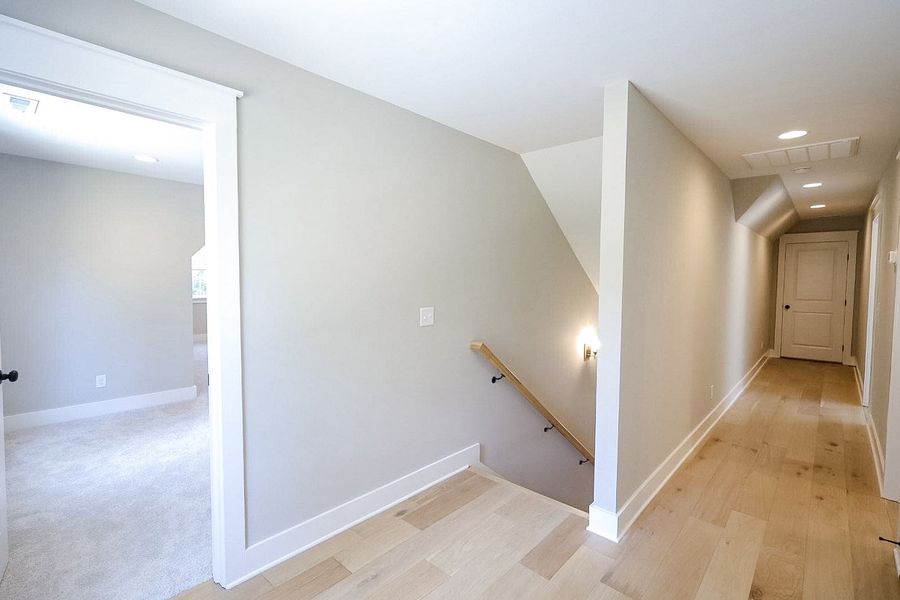 Spacious, unfurnished interior of a new home in Baker Road, Birchwood (Image 49).