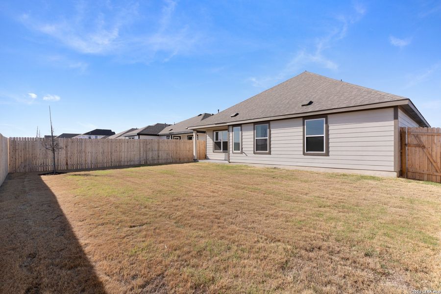 Exterior details and patio area of a home in Westridge, San Antonio (Image 18).