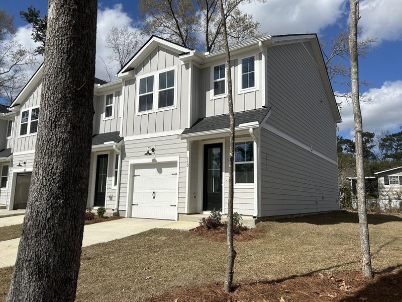 Front exterior of a new home in , Summerville, SC, highlighting curb appeal (Image 20).