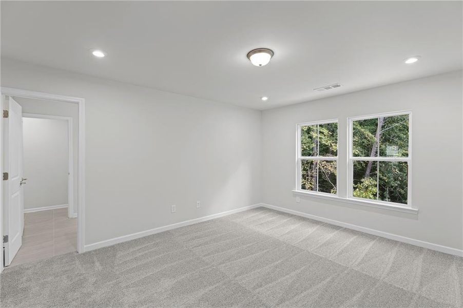 Spacious, unfurnished interior of a new home in Ansley Towns, Cumming (Image 10).