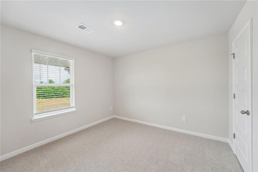 Spacious, unfurnished interior of a new home in Hemingway - Highland Series, Cumming (Image 45).
