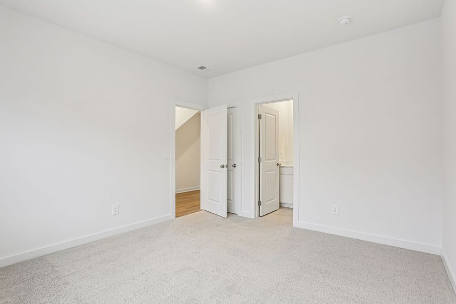 Spacious, unfurnished interior of a new home in Greystone - Highland Townhomes, Smyrna (Image 12).