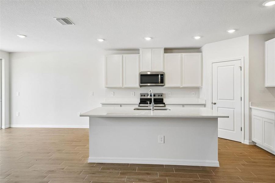 Furnished interior view inside a new home in Pine Ridge Meadows, Hudson (Image 7).