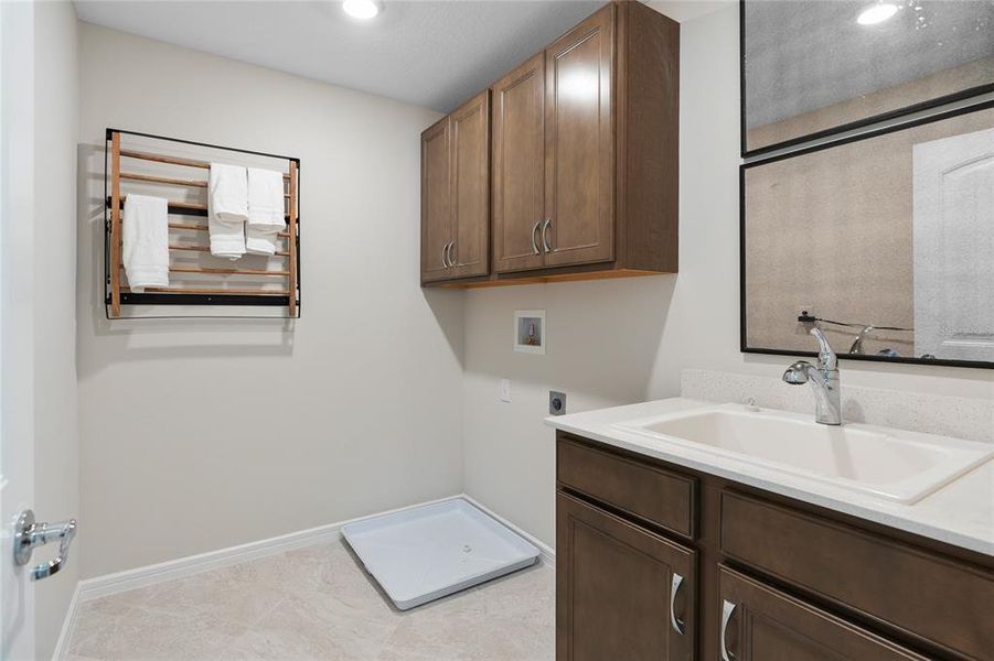 Furnished interior view inside a new home in Tohoqua, Kissimmee (Image 13).