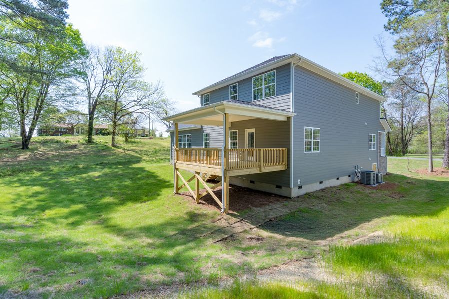 Representative exterior photo of a completed home built from the 3320 by Adams Homes in Falls of the Cape, Lillington, NC (Image 26).