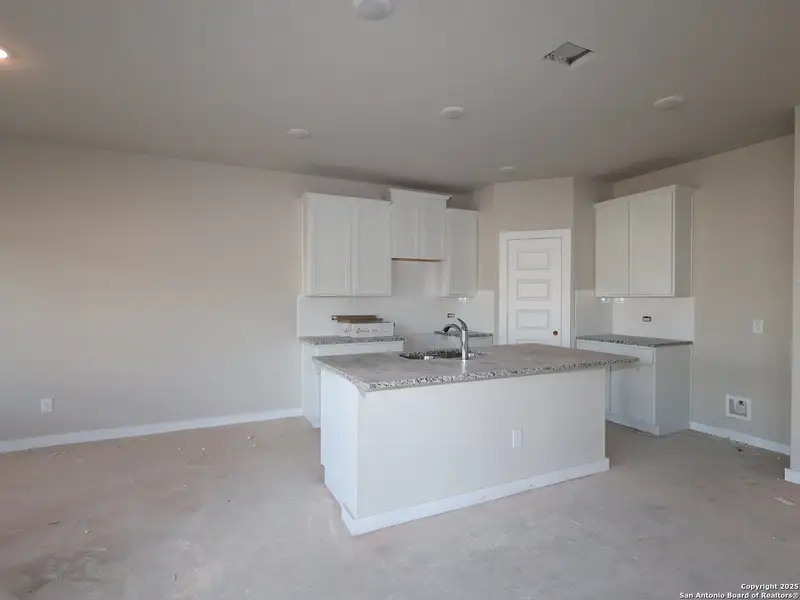 Furnished interior view inside a new home in Cinco Lakes, San Antonio (Image 4).