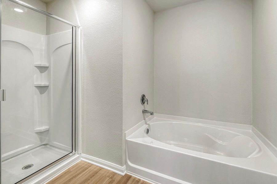 Primary Bathroom comes with a separate soaking tub and shower