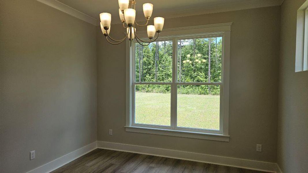 Spacious, unfurnished interior of a new home in The Enclave at French Quarter Creek, Huger (Image 19).