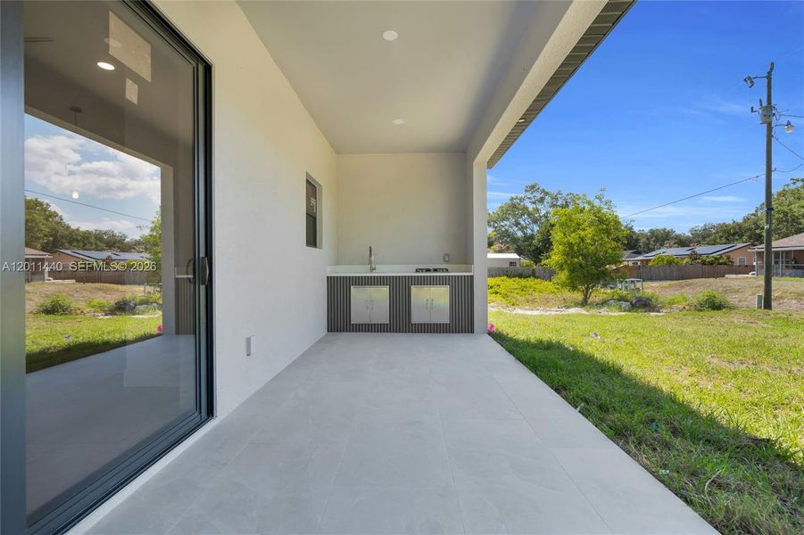 Exterior details and patio area of a home in , Lehigh Acres (Image 25).
