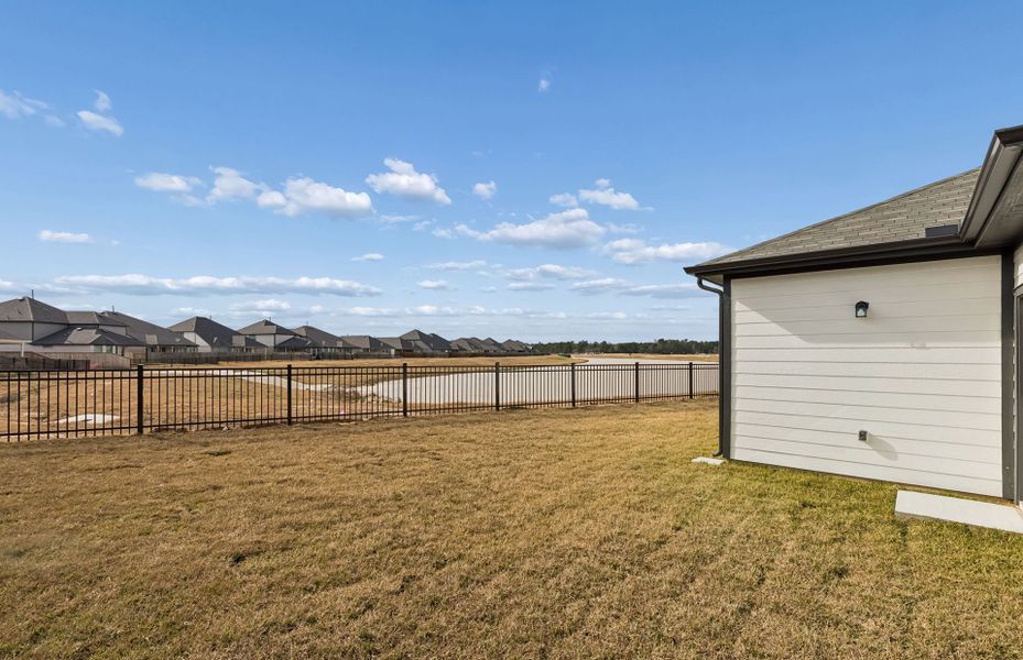 Exterior details and patio area of a home in Mavera, Conroe (Image 20).