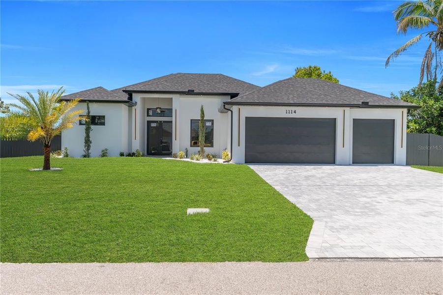 Front exterior of a new home in , Cape Coral, FL, highlighting curb appeal (Image 30).