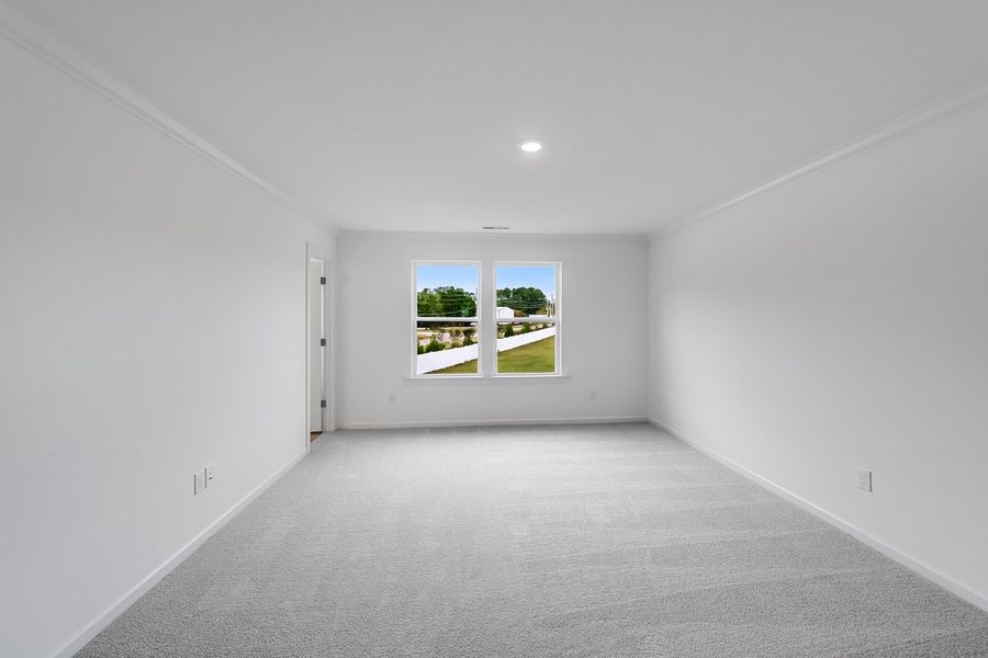 Spacious, unfurnished interior of a new home in Magnolia Townes, Wendell (Image 15).