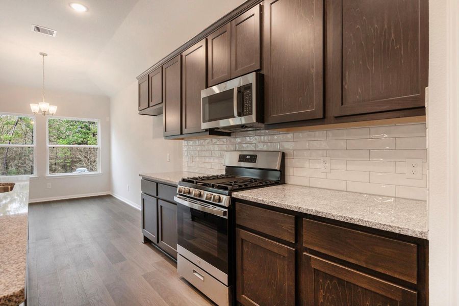 Furnished interior view inside a new home in , Bay City (Image 4). Furnished interior view inside a new home in , Bay City (Image 4).