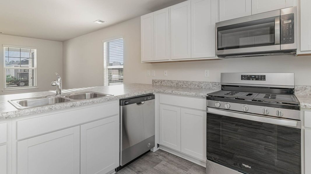 Representative furnished interior of a home built from the CURTIS by D.R. Horton in The Cottages at Blake Farm, Wilmington (Image 22). Representative furnished interior of a home built from the CURTIS by D.R. Horton in The Cottages at Blake Farm, Wilmington (Image 22).