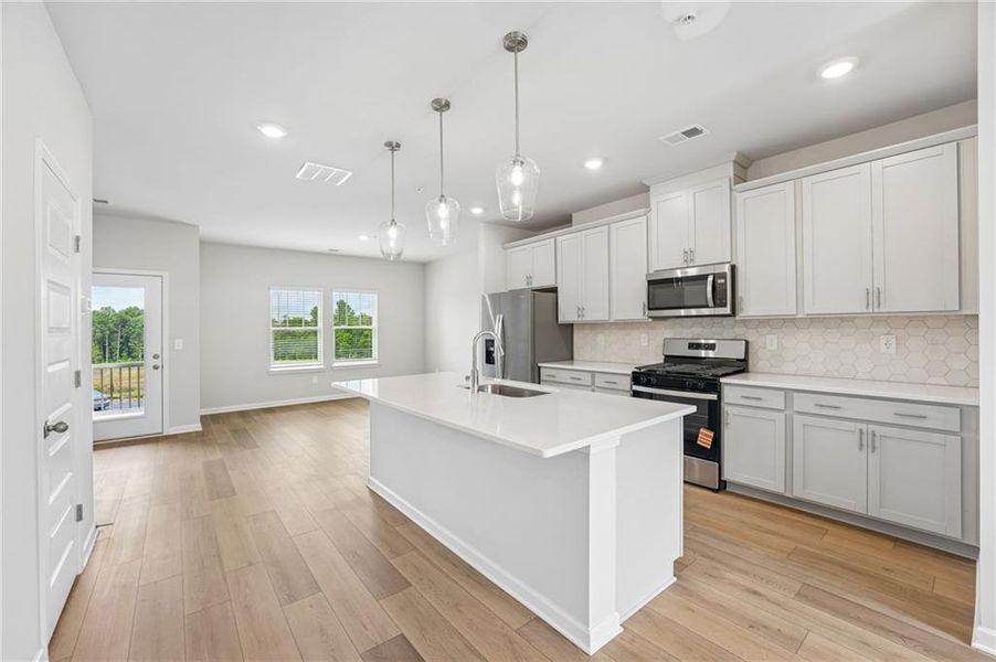 Furnished interior view inside a new home in Hemingway - Highland Series, Cumming (Image 9).