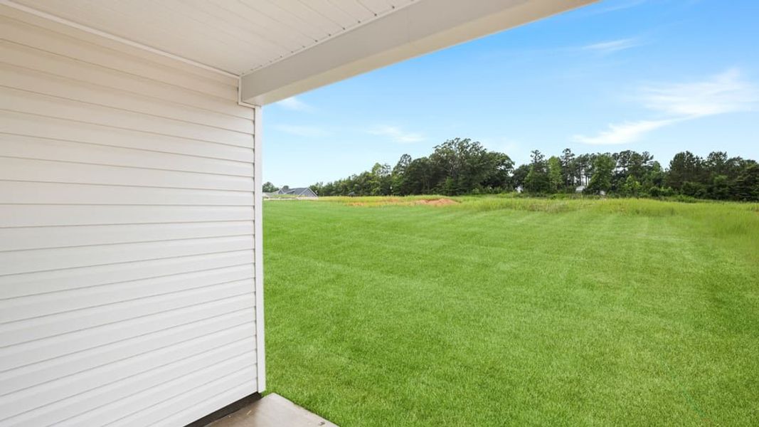 Exterior details and patio area of a home in Hunters Ridge, Woodruff (Image 3).