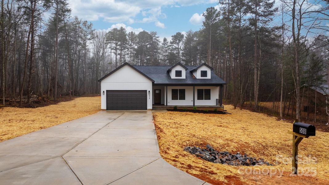 Front exterior of a new home in , Lincolnton, NC, highlighting curb appeal (Image 29).