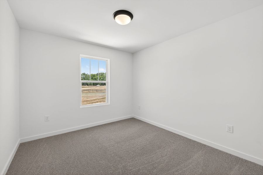 Spacious, unfurnished interior of a new home in White Oak Creek Crossing, Angier (Image 22).