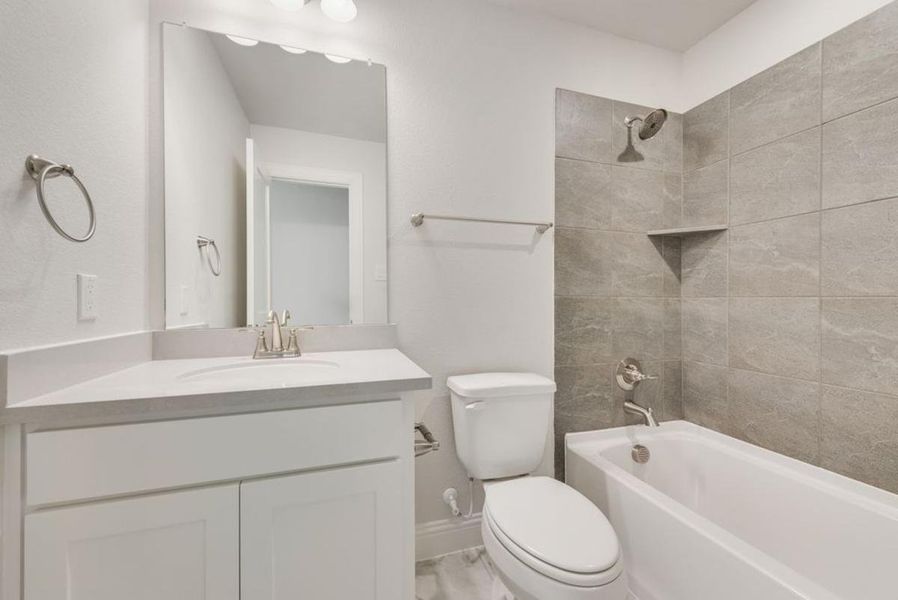 Furnished interior view inside a new home in Dominion of Pleasant Valley, Wylie (Image 24).