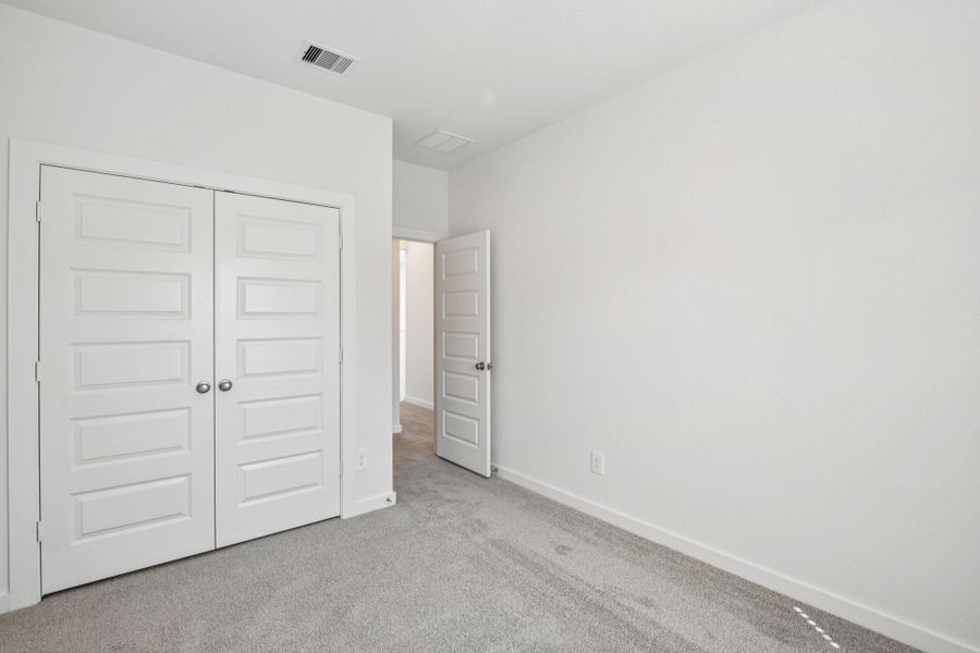 Spacious, unfurnished interior of a new home in Spring Brook Village - City Series, Houston (Image 33). Spacious, unfurnished interior of a new home in Spring Brook Village - City Series, Houston (Image 33).