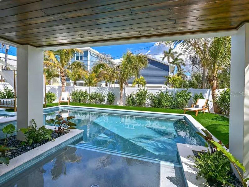 Exterior details and patio area of a home in , Bradenton Beach (Image 24).