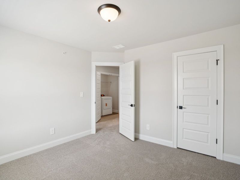 Spacious, unfurnished interior of a new home in Martin Springs - Highland Series, Lawrenceville (Image 19).