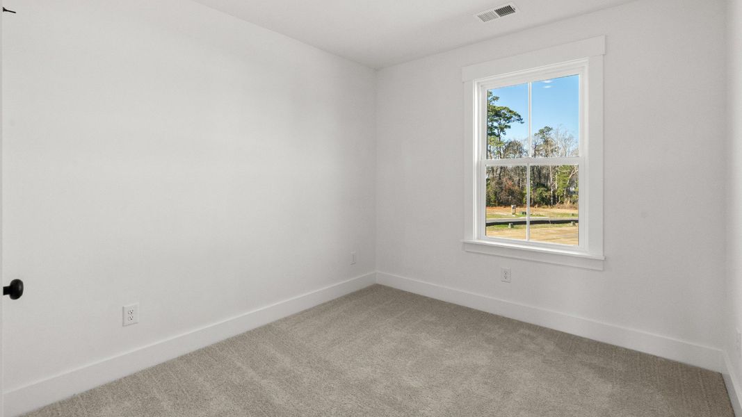 Furnished interior view inside a new home in Seabreeze Crossing, Little River (Image 17).
