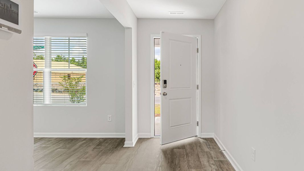 Representative unfurnished interior of a home built from the HAYDEN by D.R. Horton in Saltgrass Landing, Winnabow (Image 12).