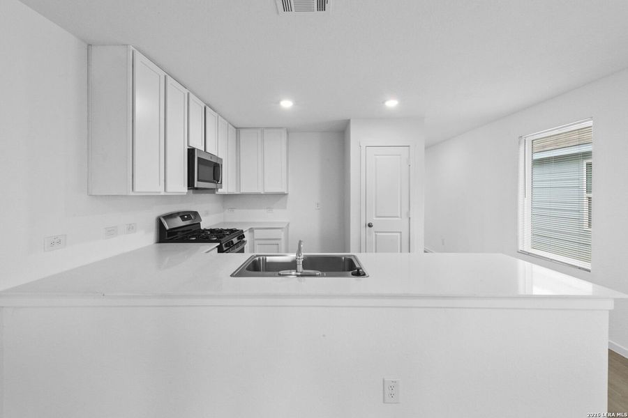 Furnished interior view inside a new home in Spring Grove, St. Hedwig (Image 4).