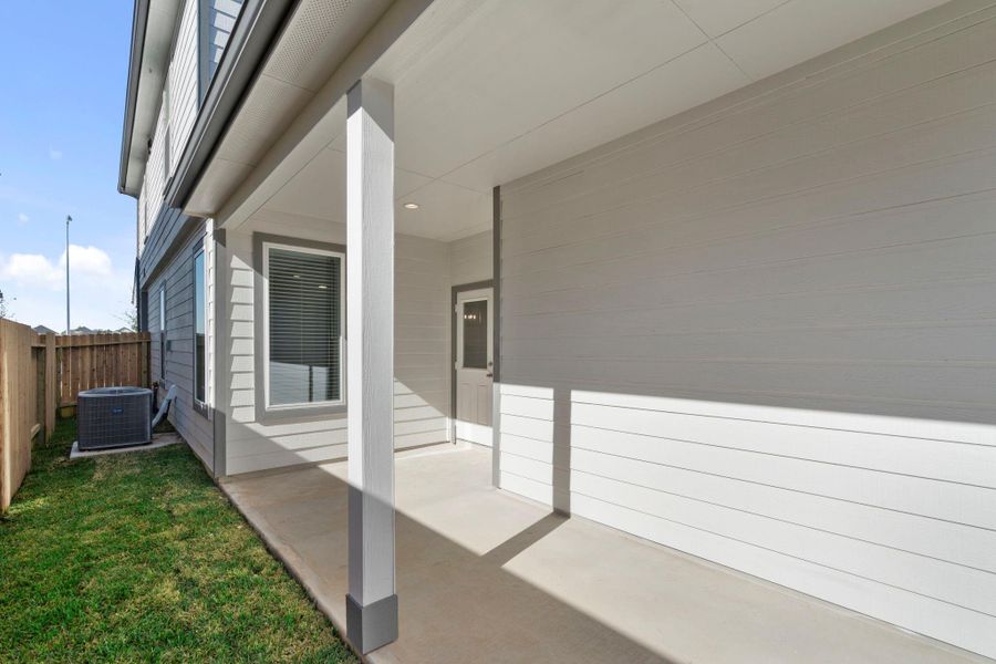 Exterior details and patio area of a home in , Houston (Image 3).