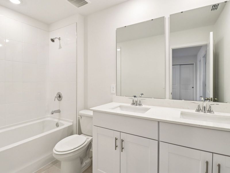 Furnished interior view inside a new home in The Reserve at Hammock Oaks - Signature Series, Lady Lake (Image 6).