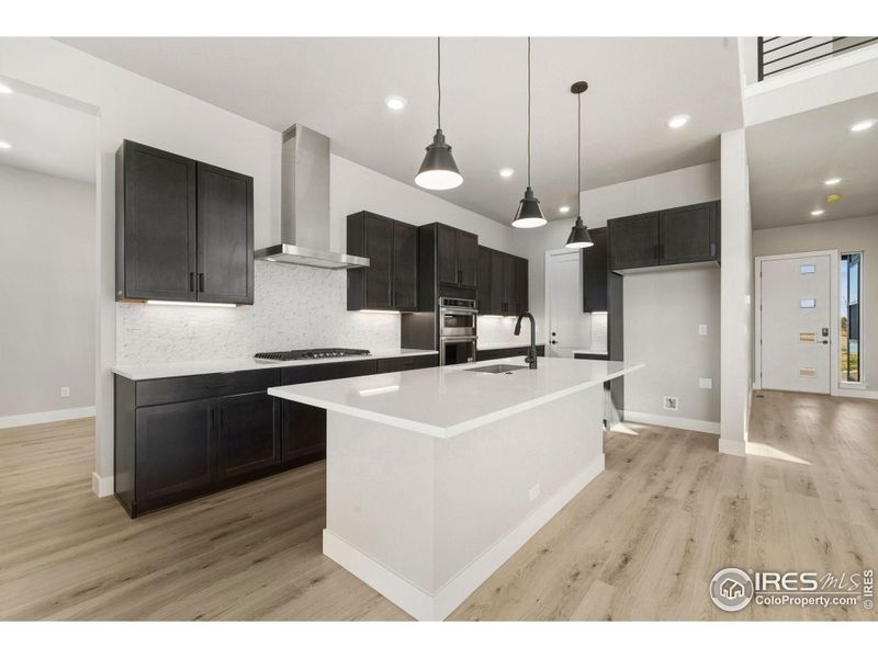 Furnished interior view inside a new home in Kitchel Lake at Serratoga Falls, Timnath (Image 6).