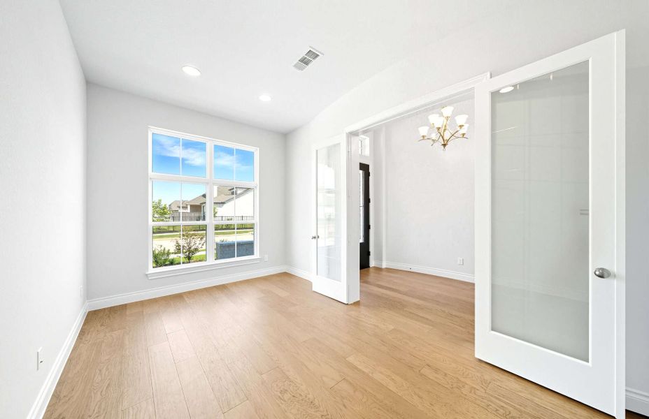 Representative unfurnished interior of a home built from the 3663 by Ravenna Homes in Artavia 70′, Conroe (Image 22).